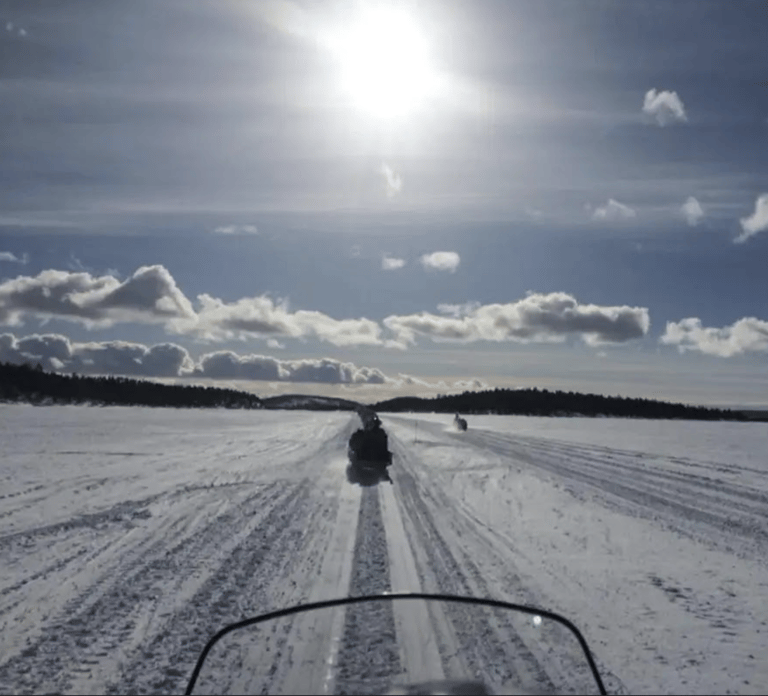 From Saariselkä: Ice Fishing Tour with Open Fire Cooking
