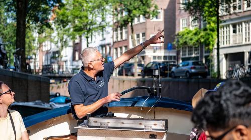 Amsterdam: Guided City Highlights Open Boat Canal Cruise Day Tours