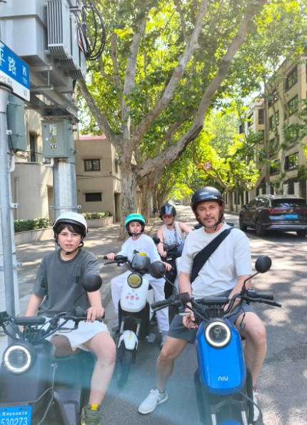 Exploring Old Shanghai by Electric Scooter (The Bund, Suzhou River, Old Town, French-style Area)Group tour (maximum 8 participants)+ Senior tour guide +Including complimentary morning tea - HolidaySG