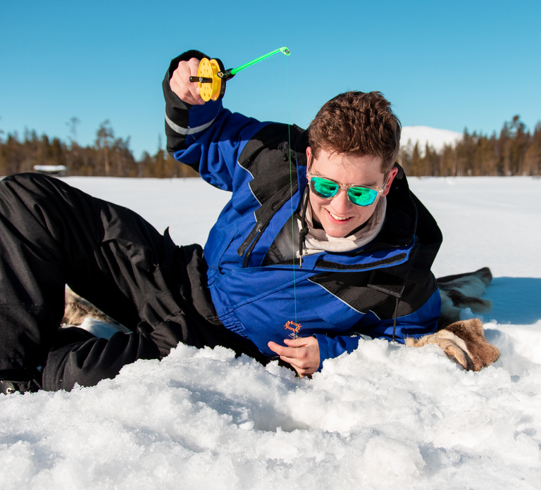 Ylläs: Snowmobile Adventure with Ice Fishing