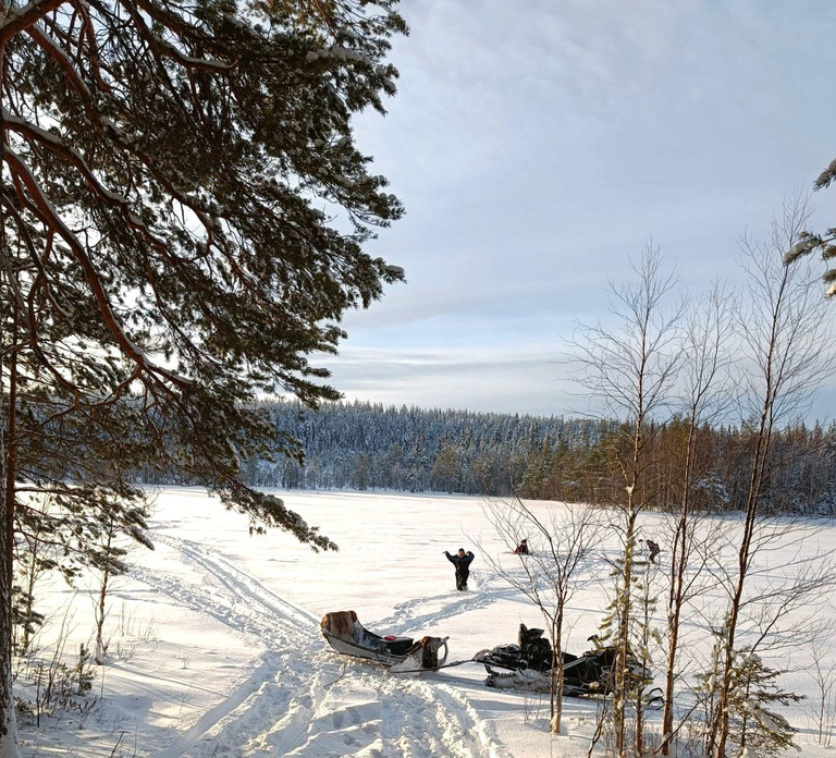 Rovaniemi: Snowmobile Sleigh Ride, Ice Fishing, & Campfire
