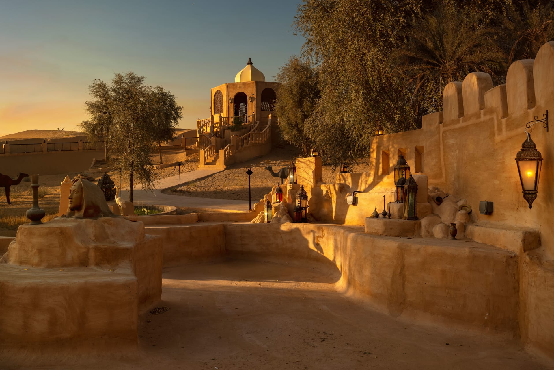 Desert camp dining area set up at a fort-style venue in the Dubai desert
