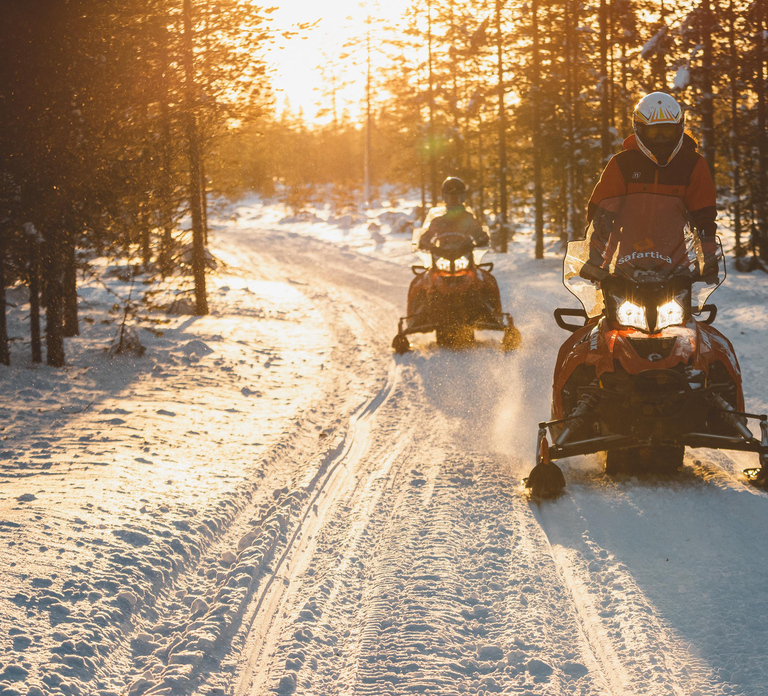 Ylläs: Snowmobile Tour to Arctic Snow Village & Snack