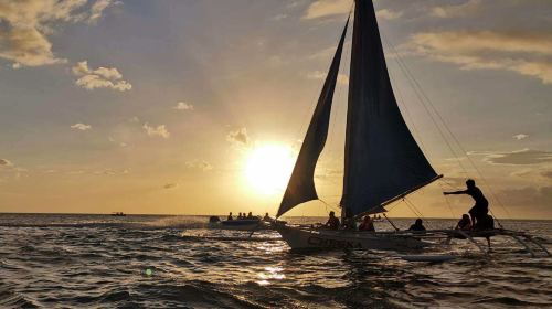 Boracay sunset sailing experience | shared boat/private charter | Romantic sailing boat experience - HolidaySG