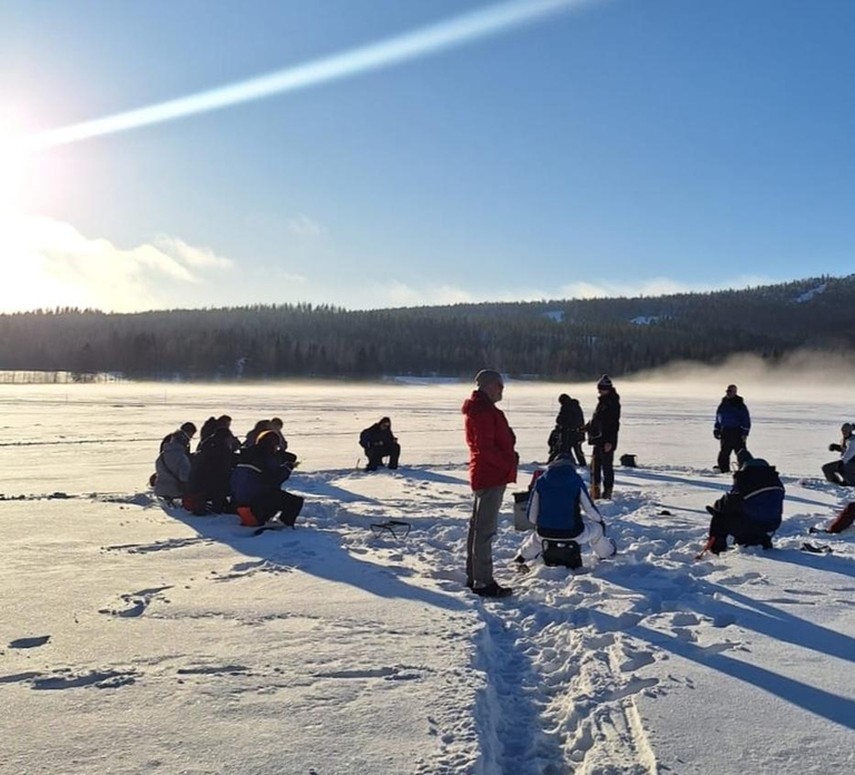 Vuokatti: Ice Fishing Trip with Hot Drinks