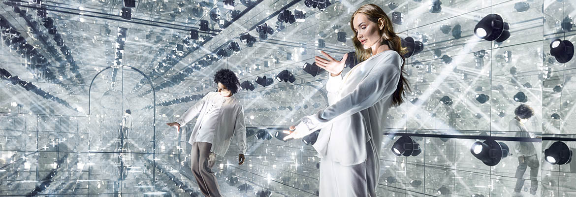 Colourful light installation with mirrored surfaces inside AYA Universe