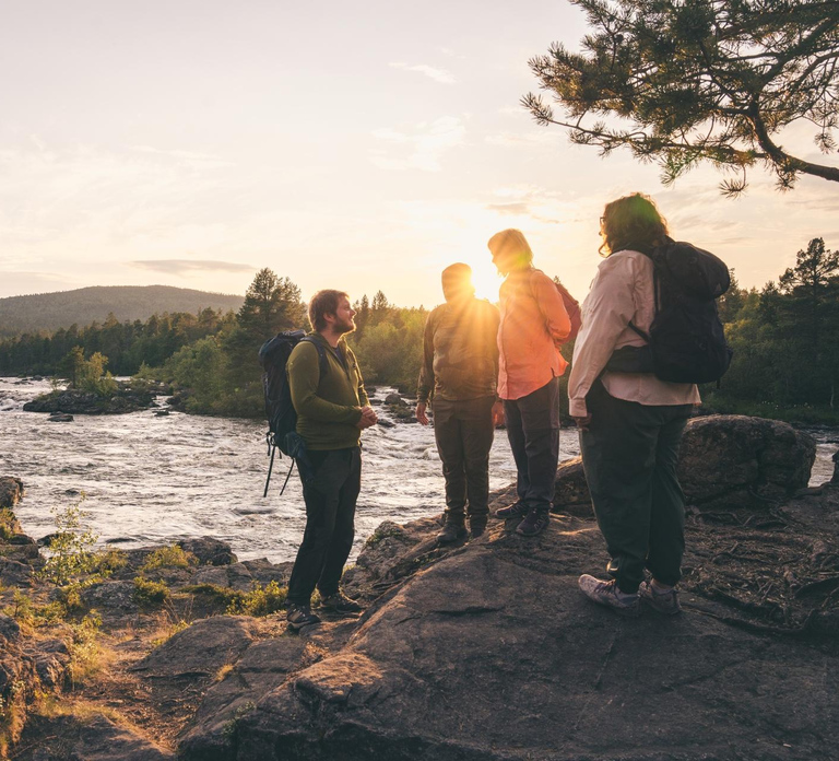 Inari: Midnight Sun Guided Hike with sparkling drinks