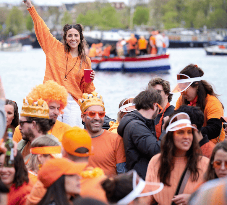 Amsterdam: King's Day Party Cruise with Open Bar & Music