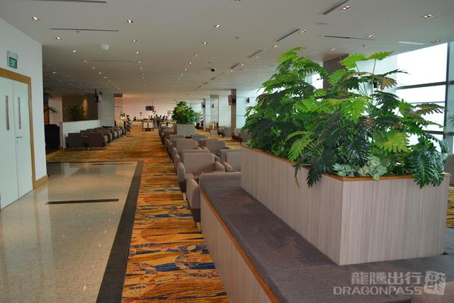 Lounge seating and buffet counter in the Mingalar Sky domestic lounge at Yangon International Airport