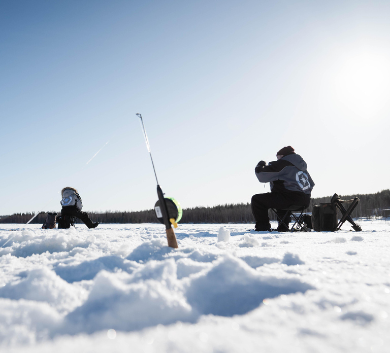 Rovaniemi: Ice Fishing on a Frozen Lake