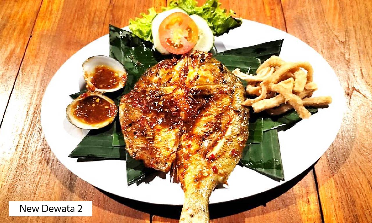 Grilled seafood dishes served at a beachfront dinner in Jimbaran, Bali