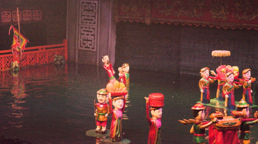 Hanoi: Street Food Walking Tour & Water Puppet Show - HolidaySG