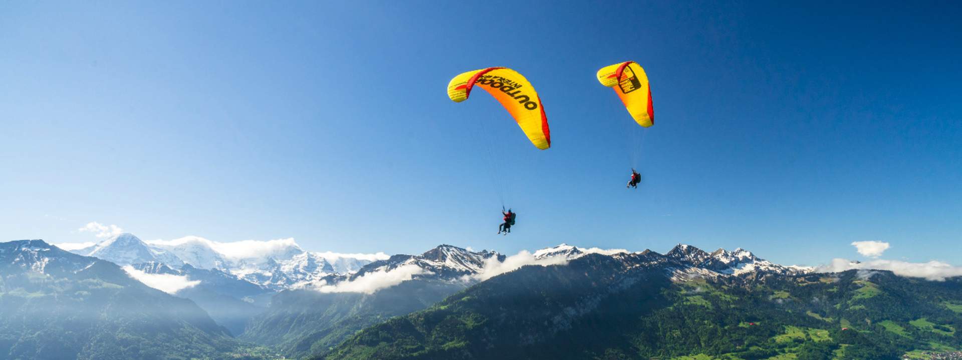Tandem Paragliding Experience in Interlaken - HolidaySG