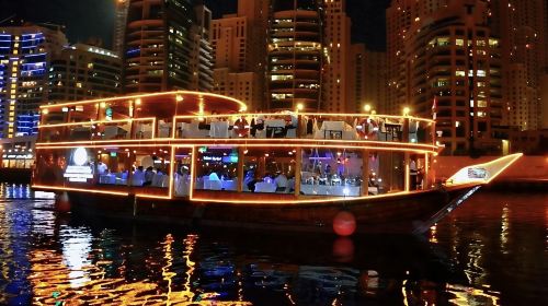 Dubai Creek cruise - New city classic night tour featuring a traditional double-decker wooden boat with dining, transfers, and performances included Day Tours