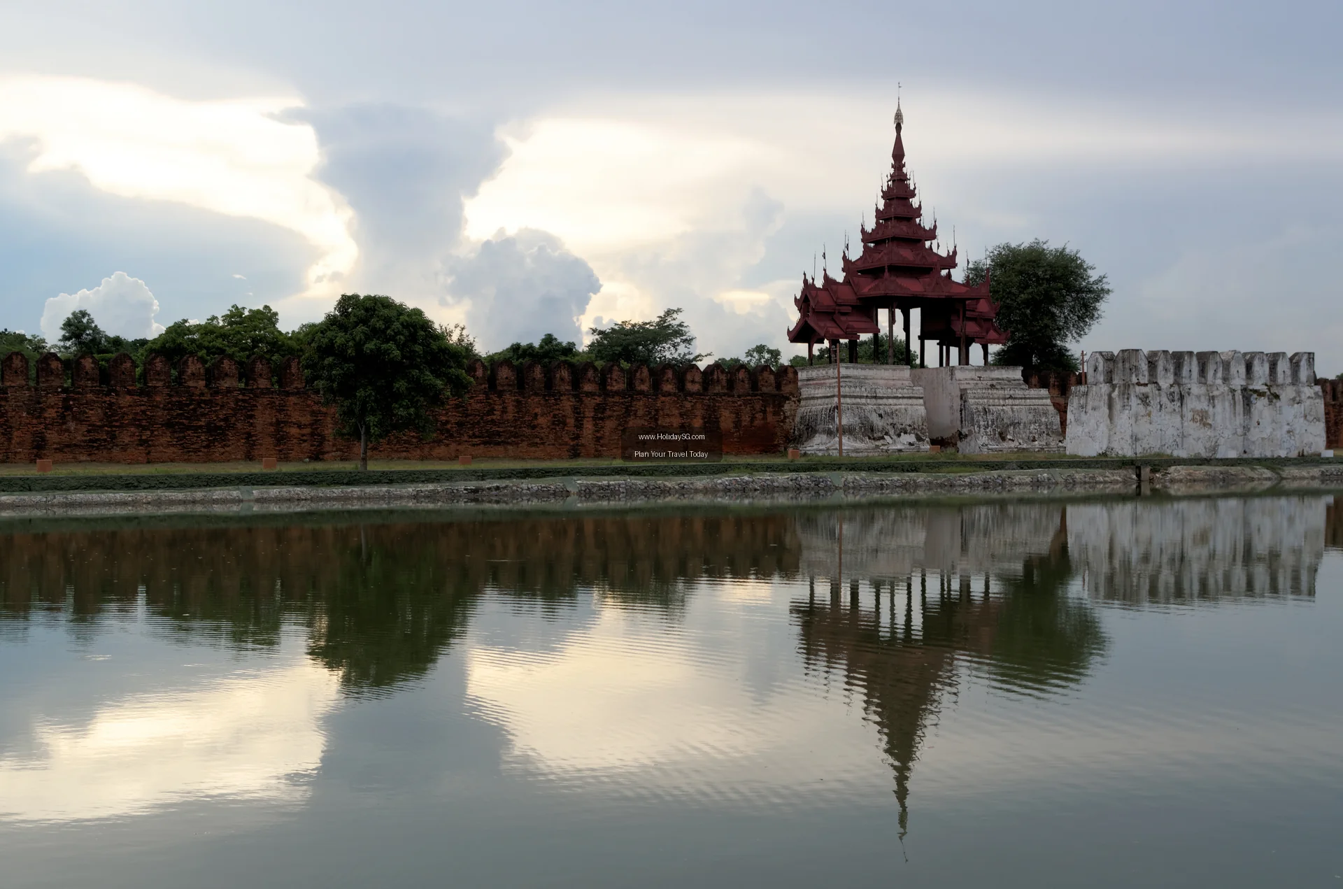 The moat and crenellated walls of Mandalay Palace in Mandalay, Myanmar